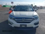 ✅ 2018 Honda Pilot EX-L • VIN: 5FNYF5H5XJB033220 • Лот: 43205648. Опубликован ранее на IAAI с пробегом 117 623 миль. Бесплатный доступ к архиву аукционных продаж из США и подробный отчёт об истории автомобиля на DreamBid. Изображение 12.