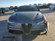 ✅ 2021 Alfa Romeo Giulia Quadrifoglio • VIN: ZARFAMEV2M7646078 • Lot: 82237543. Wystawiony na Copart z przebiegiem Nie podano. Bezpłatny archiwum sprzedaży aukcyjnych z USA i szczegółowy raport historii pojazdu na DreamBid. Zdjęcie 5.