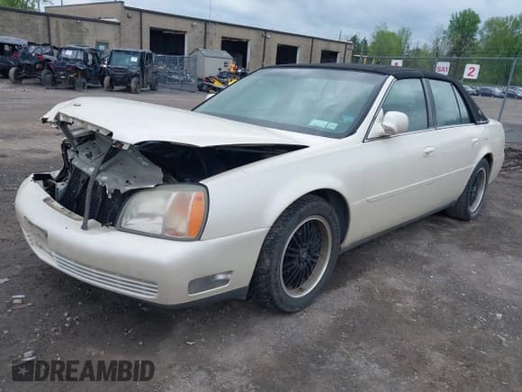 ✅ 2001 Cadillac DeVille • VIN: 1G6KD54YX1U239255 • Lot: 42253880. Listed on IAAI with 139,141 mi. Free auction sales archive from the USA and detailed vehicle history report at DreamBid. Image 18.