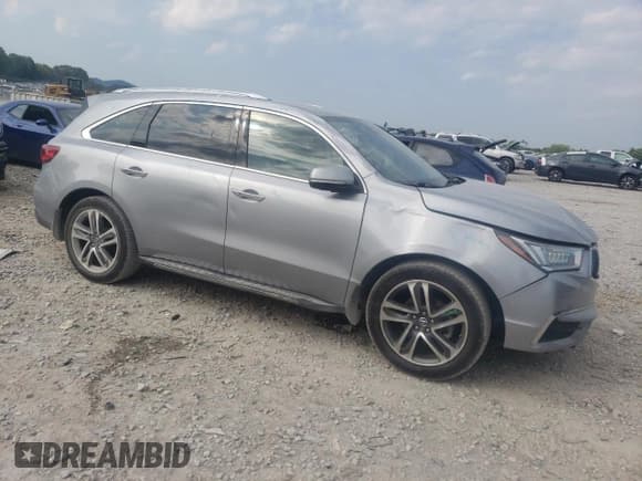 ✅ 2018 Acura MDX Advance • VIN: 5J8YD4H8XJL024025 • Лот: 60965335. Опубликован ранее на Copart с пробегом 124 839 миль. Бесплатный доступ к архиву аукционных продаж из США и подробный отчёт об истории автомобиля на DreamBid. Изображение 4.