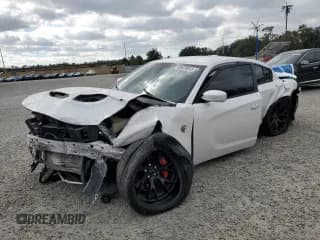 ✅ 2016 Dodge Charger SRT Hellcat • VIN: 2C3CDXL97GH214482 • Lot: 89439015. Wystawiony na Copart z przebiegiem 137 647 mil. Bezpłatny archiwum sprzedaży aukcyjnych z USA i szczegółowy raport historii pojazdu na DreamBid. Zdjęcie 1.