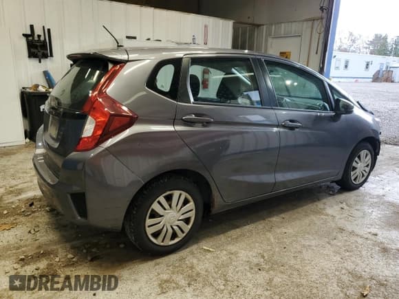 ✅ 2015 Honda Fit LX • VIN: 3HGGK5H57FM725463 • Лот: 91821645. Опубликован ранее на Copart с пробегом Не указан. Бесплатный доступ к архиву аукционных продаж из США и подробный отчёт об истории автомобиля на DreamBid. Изображение 3.