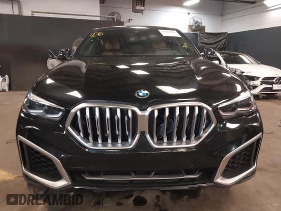 ✅ 2021 BMW X6 xDrive40i • VIN: 5UXCY6C07M9E51305 • Лот: 41566916. Опубликован ранее на IAAI с пробегом 53 010 миль. Бесплатный доступ к архиву аукционных продаж из США и подробный отчёт об истории автомобиля на DreamBid. Изображение 12.