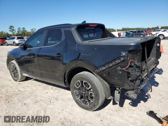 2022 Hyundai Santa Cruz SEL Premium z VIN 5NTJDDAF9NH006877, wystawiony jako Copart lot #81971004 z przebiegiem 36 585 mil mil oraz Szkoda całkowita • Salvage title. Historia ofert i sprzedaży dostępna na DreamBid. Obrazek 2.