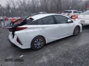✅ 2022 Toyota Prius XLE • VIN: JTDKAMFP4N3202279 • Lot: 43688179. Listed on IAAI with 62,855 mi. Free auction sales archive from the USA and detailed vehicle history report at DreamBid. Image 4.