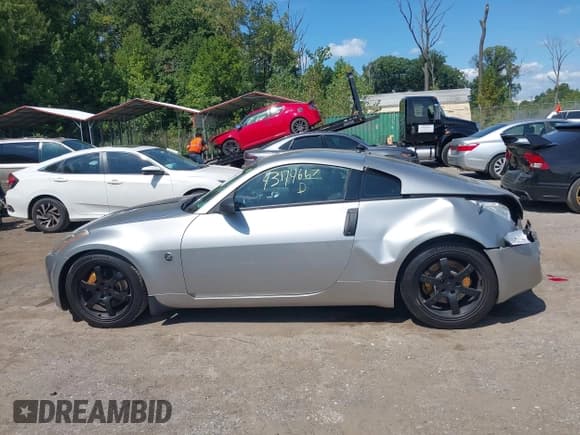 ✅ 2003 Nissan 350Z Touring • VIN: JN1AZ34E73T010757 • Lot: 43174667. Wystawiony na IAAI z przebiegiem 119 020 mil. Bezpłatny archiwum sprzedaży aukcyjnych z USA i szczegółowy raport historii pojazdu na DreamBid. Zdjęcie 14.