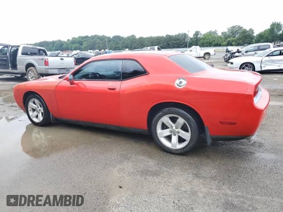 2014 Dodge Challenger SXT 100th Anniversary z VIN 2C3CDYAG1EH278828, wystawiony jako Copart lot #58417075 z przebiegiem 136 953 mil mil oraz Szkoda całkowita • Salvage title. Historia ofert i sprzedaży dostępna na DreamBid. Obrazek 2.