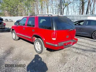 ✅ 1999 Chevrolet Blazer LT • VIN: 1GNDT13WXX2177269 • Lot: 42095422. Wystawiony na IAAI z przebiegiem 210 049 mil. Bezpłatny archiwum sprzedaży aukcyjnych z USA i szczegółowy raport historii pojazdu na DreamBid. Zdjęcie 3.