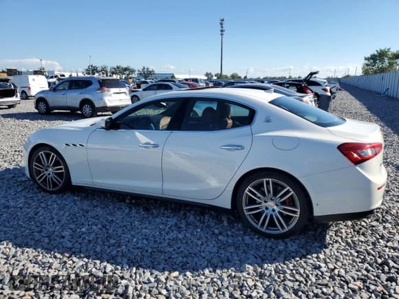✅ 2015 Maserati Ghibli S Q4 • VIN: ZAM57RTA3F1149396 • Lot: 86831565. Listed on Copart with 74,276 mi. Free auction sales archive from the USA and detailed vehicle history report at DreamBid. Image 2.