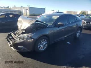 ✅ 2016 Mazda 3 i Touring • VIN: JM1BM1W75G1300984 • Lot: 93360905. Listed on Copart with 86,103 mi. Free auction sales archive from the USA and detailed vehicle history report at DreamBid. Image 1.