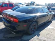 ✅ 2014 Dodge Charger Police • VIN: 2C3CDXAT8EH121224 • Lot: 43842012. Listed on IAAI with 140,146 mi. Free auction sales archive from the USA and detailed vehicle history report at DreamBid. Image 4.