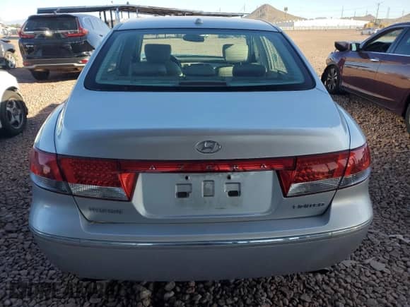 2007 Hyundai Azera SE z VIN KMHFC46F57A205043, wystawiony jako Copart lot #49531885 z przebiegiem 107 272 mil mil oraz Czysty tytuł • Clean title. Historia ofert i sprzedaży dostępna na DreamBid. Obrazek 6.