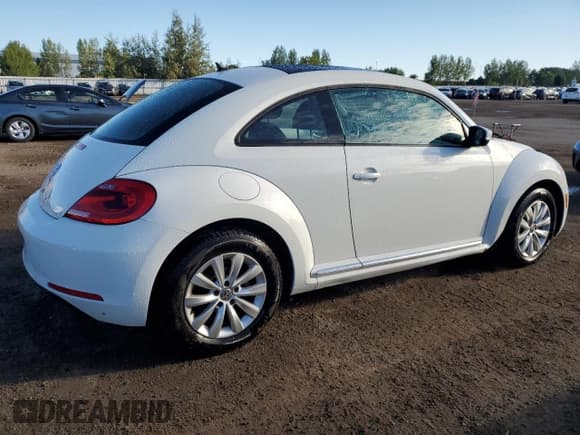 ✅ 2014 Volkswagen Beetle 2.0L TDI w/Sun/Sound/Nav • VIN: 3VWJL7ATXEM640246 • Лот: 69774095. Опубликован ранее на Copart с пробегом 155 361 миль. Бесплатный доступ к архиву аукционных продаж из США и подробный отчёт об истории автомобиля на DreamBid. Изображение 3.