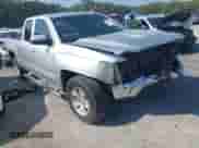 2018 Chevrolet Silverado 1500 LT z VIN 1GCRCREH0JZ287029, wystawiony jako IAAI lot #43252285 z przebiegiem 154 918 mil mil oraz . Historia ofert i sprzedaży dostępna na DreamBid. Obrazek 1.