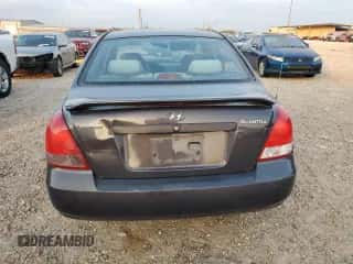 2003 Hyundai Elantra GLS z VIN KMHDN45D53U572664, wystawiony jako Copart lot #82387214 z przebiegiem Nie podano mil oraz Szkoda całkowita • Salvage title. Historia ofert i sprzedaży dostępna na DreamBid. Obrazek 6.