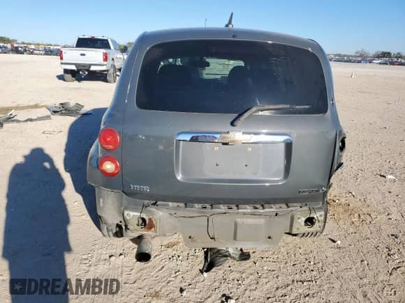 2009 Chevrolet HHR 1LT with VIN 3GNCA23V39S601297, listed as a Copart auction lot 82561015 with 114,705 mi miles and Salvage title. Bid and sale history available at DreamBid. Image 6.