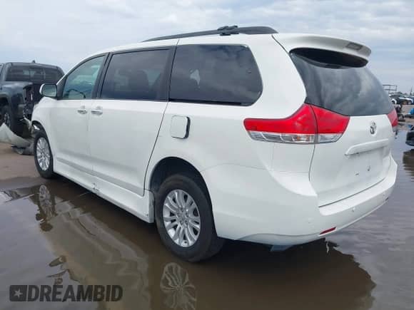 2011 Toyota Sienna XLE AAS with VIN 5TDYK3DC1BS106301, listed as a IAAI auction lot 43423294 with 158,803 mi miles and . Bid and sale history available at DreamBid. Image 3.