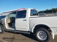 ✅ 2009 Nissan Titan LE • VIN: 1N6BA07D79N318614 • Lot: 43460475. Listed on IAAI with 232,157 mi. Free auction sales archive from the USA and detailed vehicle history report at DreamBid. Image 15.