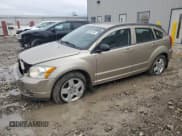 ✅ 2009 Dodge Caliber SXT • VIN: 1B3HB48AX9D259703 • Лот: 80551064. Опубликован ранее на Copart с пробегом 128 818 миль. Бесплатный доступ к архиву аукционных продаж из США и подробный отчёт об истории автомобиля на DreamBid. Изображение 1.