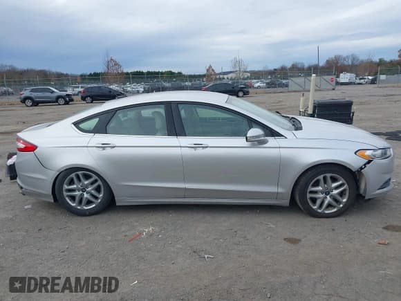 ✅ 2016 Ford Fusion SE • VIN: 3FA6P0H79GR177119 • Lot: 43719191. Wystawiony na IAAI z przebiegiem 106 972 mil. Bezpłatny archiwum sprzedaży aukcyjnych z USA i szczegółowy raport historii pojazdu na DreamBid. Zdjęcie 13.