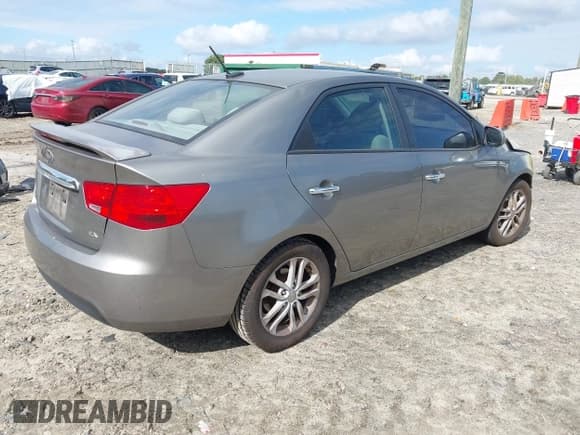 ✅ 2012 Kia Forte EX • VIN: KNAFU4A26C5597763 • Lot: 43357086. Listed on IAAI with 135,667 mi. Free auction sales archive from the USA and detailed vehicle history report at DreamBid. Image 4.