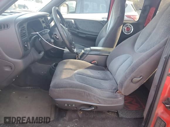 1999 Dodge Dakota Sport z VIN 1B7GL22Z4XS276158, wystawiony jako Copart lot #76972714 z przebiegiem 159 628 mil mil oraz Szkoda całkowita • Salvage title. Historia ofert i sprzedaży dostępna na DreamBid. Obrazek 7.