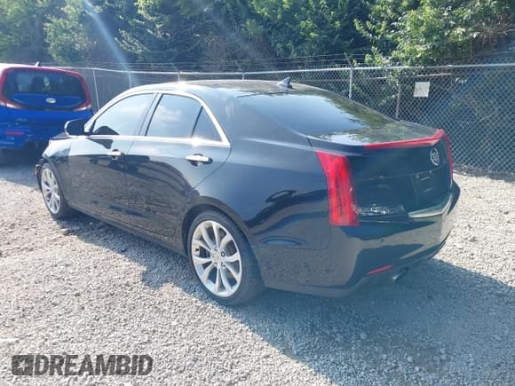 ✅ 2013 Cadillac ATS Performance • VIN: 1G6AJ5S31D0123188 • Lot: 42696887. Listed on IAAI with 142,630 mi. Free auction sales archive from the USA and detailed vehicle history report at DreamBid. Image 3.