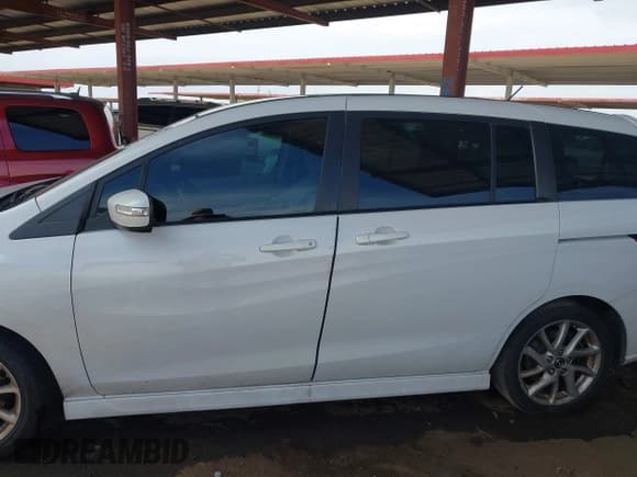 ✅ 2013 Mazda 5 Touring • VIN: JM1CW2CL0D0159894 • Lot: 42386026. Wystawiony na IAAI z przebiegiem 121 879 mil. Bezpłatny archiwum sprzedaży aukcyjnych z USA i szczegółowy raport historii pojazdu na DreamBid. Zdjęcie 14.