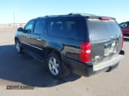 ✅ 2014 Chevrolet Suburban LTZ • VIN: 1GNSKKE74ER169548 • Lot: 43560269. Listed on IAAI with 255,008 mi. Free auction sales archive from the USA and detailed vehicle history report at DreamBid. Image 3.