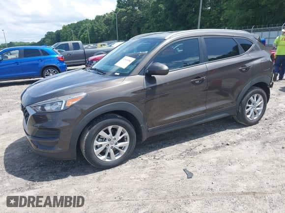 2019 Hyundai Tucson Value z VIN KM8J33A49KU056444, wystawiony jako IAAI lot #42468980 z przebiegiem 40 066 mil mil oraz . Historia ofert i sprzedaży dostępna na DreamBid. Obrazek 18.