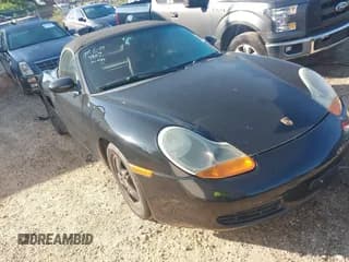 ✅ 1999 Porsche Boxster • VIN: WP0CA2983XU631827 • Lot: 42554867. Listed on IAAI with Not provided. Free auction sales archive from the USA and detailed vehicle history report at DreamBid. Image 1.