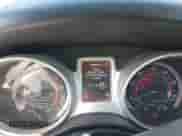 2015 Dodge Journey American Value z VIN 3C4PDCAB7FT559299, wystawiony jako IAAI lot #43409195 z przebiegiem 183 905 mil mil oraz . Historia ofert i sprzedaży dostępna na DreamBid. Obrazek 7.