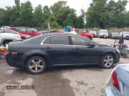 ✅ 2009 Chevrolet Malibu 2LT • VIN: 1G1ZJ57B294153177 • Lot: 43242241. Listed on IAAI with 210,315 mi. Free auction sales archive from the USA and detailed vehicle history report at DreamBid. Image 13.