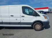 ✅ 2015 Ford Transit • VIN: 1FTNR2ZMXFKA18841 • Lot: 42489080. Listed on IAAI with 142,648 mi. Free auction sales archive from the USA and detailed vehicle history report at DreamBid. Image 13.