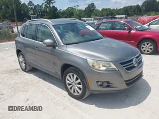 ✅ 2011 Volkswagen Tiguan S • VIN: WVGAV7AX4BW505769 • Lot: 42616722. Listed on IAAI with 55,844 mi. Free auction sales archive from the USA and detailed vehicle history report at DreamBid. Image 1.