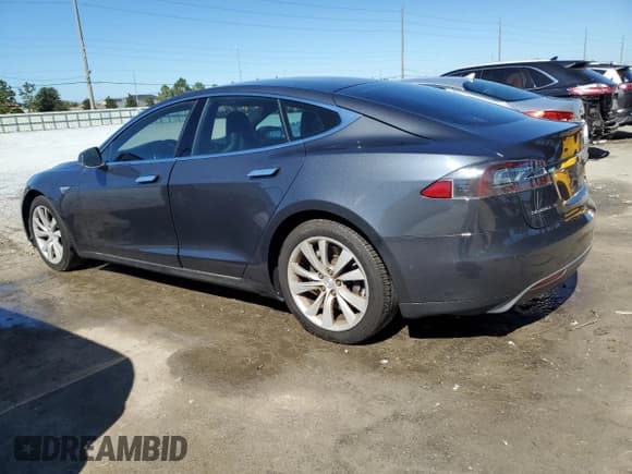 ✅ 2015 Tesla Model S 85 • VIN: 5YJSA1H18FF099766 • Lot: 90036645. Listed on Copart with 101,607 mi. Free auction sales archive from the USA and detailed vehicle history report at DreamBid. Image 2.