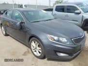✅ 2011 Kia Optima EX • VIN: KNAGN4A64B5142123 • Lot: 43048185. Listed on IAAI with 149,704 mi. Free auction sales archive from the USA and detailed vehicle history report at DreamBid. Image 1.