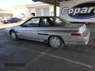 ✅ 1989 Subaru XT • VIN: JF1AX7320KD309697 • Лот: 63270595. Опубликован ранее на Copart с пробегом 114 546 миль. Бесплатный доступ к архиву аукционных продаж из США и подробный отчёт об истории автомобиля на DreamBid. Изображение 2.