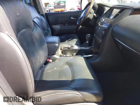 ✅ 2014 Infiniti QX80 • VIN: JN8AZ2NE9E9064040 • Lot: 43014644. Listed on IAAI with 141,766 mi. Free auction sales archive from the USA and detailed vehicle history report at DreamBid. Image 5.