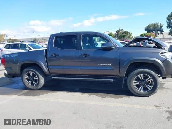 ✅ 2017 Toyota Tacoma SR5 • VIN: 5TFCZ5ANXHX081201 • Lot: 43354371. Listed on IAAI with 83,668 mi. Free auction sales archive from the USA and detailed vehicle history report at DreamBid. Image 14.