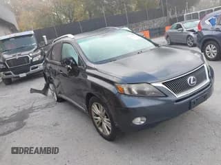 ✅ 2011 Lexus RX 450h • VIN: JTJBC1BA8B2037314 • Lot: 43465263. Listed on IAAI with 165,296 mi. Free auction sales archive from the USA and detailed vehicle history report at DreamBid. Image 1.