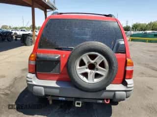 2003 Chevrolet Tracker с VIN 2CNBJ134136939532, выставлен на аукционе Copart как лот 68782145 с пробегом 162 827 миль миль и Списание • Salvage title. История ставок и продаж доступна на DreamBid. Изображение 6.