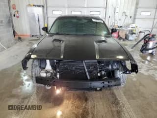 ✅ 2014 Dodge Challenger SXT • VIN: 2C3CDYAG8EH294606 • Lot: 77543364. Wystawiony na Copart z przebiegiem 99 934 mil. Bezpłatny archiwum sprzedaży aukcyjnych z USA i szczegółowy raport historii pojazdu na DreamBid. Zdjęcie 5.