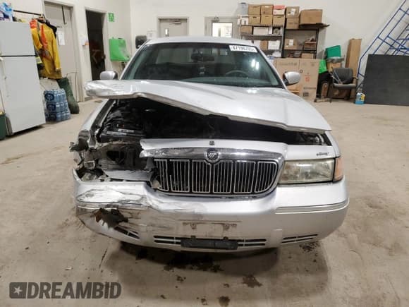 ✅ 1998 Mercury Grand Marquis GS • VIN: 2MEFM74W1WX677895 • Lot: 87198205. Wystawiony na Copart z przebiegiem 193 515 mil. Bezpłatny archiwum sprzedaży aukcyjnych z USA i szczegółowy raport historii pojazdu na DreamBid. Zdjęcie 5.