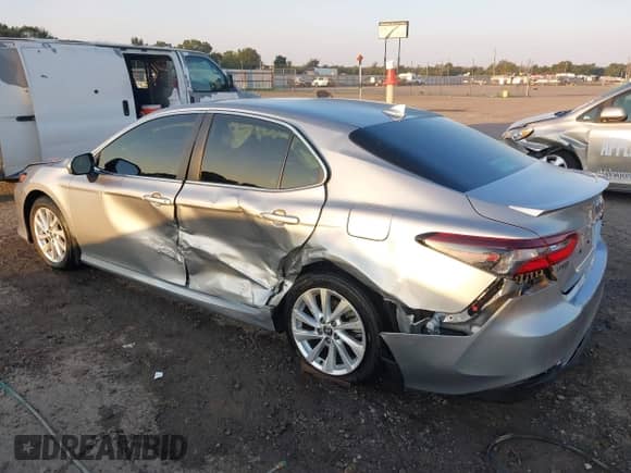 2023 Toyota Camry LE z VIN 4T1C11AK4PU147534, wystawiony jako IAAI lot #43337127 z przebiegiem 11 969 mil mil oraz . Historia ofert i sprzedaży dostępna na DreamBid. Obrazek 3.