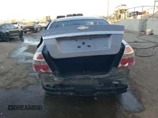 2007 Chevrolet Aveo LS z VIN KL1TD56677B075195, wystawiony jako Copart lot #84818114 z przebiegiem 98 549 mil mil oraz Szkoda całkowita • Salvage title. Historia ofert i sprzedaży dostępna na DreamBid. Obrazek 6.