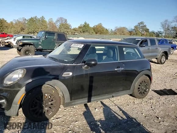 ✅ 2018 MINI Hardtop Cooper • VIN: WMWXP5C58J2G62316 • Lot: 89538315. Listed on Copart with 70,418 mi. Free auction sales archive from the USA and detailed vehicle history report at DreamBid. Image 13.