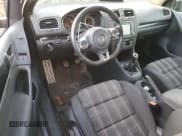 ✅ 2012 Volkswagen Golf GTI w/Conv & Sunroof • VIN: WVWEV7AJ9CW114572 • Lot: 88404325. Listed on Copart with 130,549 mi. Free auction sales archive from the USA and detailed vehicle history report at DreamBid. Image 8.