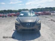 ✅ 2016 Mazda CX-5 Grand Touring • VIN: JM3KE2DY7G0782899 • Lot: 42949510. Wystawiony na IAAI z przebiegiem 85 502 mil. Bezpłatny archiwum sprzedaży aukcyjnych z USA i szczegółowy raport historii pojazdu na DreamBid. Zdjęcie 12.