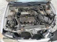 ✅ 1998 Ford Escort SE • VIN: 1FAFP13P6WW182609 • Lot: 77876884. Listed on Copart with 165,162 mi. Free auction sales archive from the USA and detailed vehicle history report at DreamBid. Image 12.